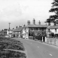 The Red Lion (middle), cottages (left) and Manse (right)